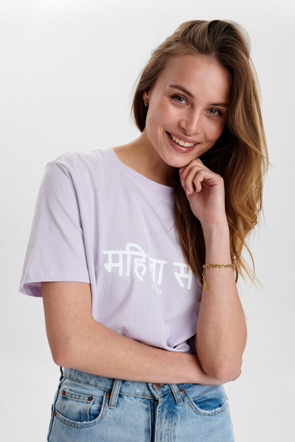 A model wearing LittleBigHelp's sisterhood T-shirt